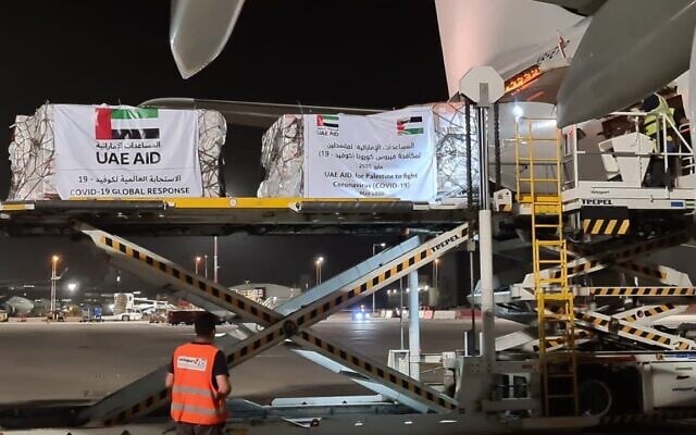 An Etihad Airways flight with aid for the Palestinians to fight the coronavirus pandemic is unloaded at Ben Gurion Airport on May 19, 2020. (Nickolay Mladenov/Twitter) An Etihad Airways flight with aid for the Palestinians to fight the coronavirus pandemic is unloaded at Ben Gurion Airport on May 19, 2020. (Nickolay Mladenov/Twitter)