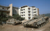 IDF tanks near houses in the southern Lebanese city of Tyre on July 22, 1982. (Yossi Zamir/Flash90)