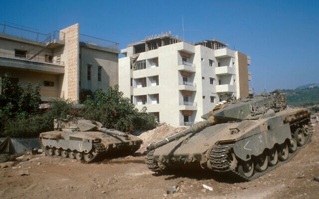 IDF tanks near houses in the southern Lebanese city of Tyre on July 22, 1982. (Yossi Zamir/Flash90) IDF tanks near houses in the southern Lebanese city of Tyre on July 22, 1982. (Yossi Zamir/Flash90)