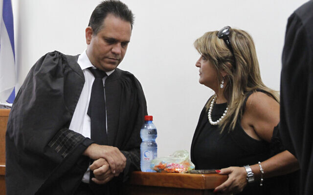 Attorney Micha Fettman (L) in the District Court in Jerusalem on September 05, 2011 with his client Shula Zaken (Miriam Alster/FLASH90) Attorney Micha Fettman (L) in the District Court in Jerusalem on September 05, 2011 with his client Shula Zaken (Miriam Alster/FLASH90)
