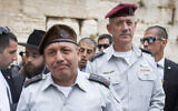 Gadi Eisenkot and Benny Gantz are seen at the Western Wall in Jerusalem, February 16, 2015, as the former prepared to take over from the latter as IDF chief of staff. (Yonatan Sindel/Flash90)