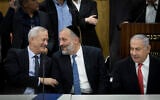 Shas party chairman Interior Minister Aryeh Deri (center), Prime Minister Benjamin Netanyahu (left), and Blue and White leader Benny Gantz, at the Knesset on November 4, 2019. (Hadas Parush/Flash90)
