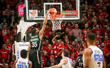 The Hapoel Jerusalem and Ironi Nahariya teams play in Tel Aviv during the final of the Israeli Basketball State Cup on February 13, 2020. (Flash90)