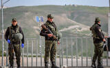 Palestinian security forces man a road block at the entrance to the West Bank city of Bethlehem, March 19, 2020. (Wisam Hashlamoun/Flash90)