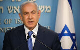 Prime Minister Benjamin Netanyahu gives a televised statement at the Prime Minister's office in Jerusalem on March 25, 2020. (Olivier Fitoussi/Flash90)