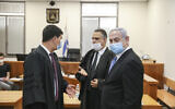 Prime Minister Benjamin Netanyahu (right) on trial at the District Court in Jerusalem on May 24, 2020. (Amit Shabi/POOL)