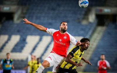 Israeli soccer returns after months of coronavirus hiatus, with a Premier League match between Beitar Jerusalem and Hapoel Beersheba at the Teddy Stadium in Jerusalem on May 30, 2020 (Flash90)