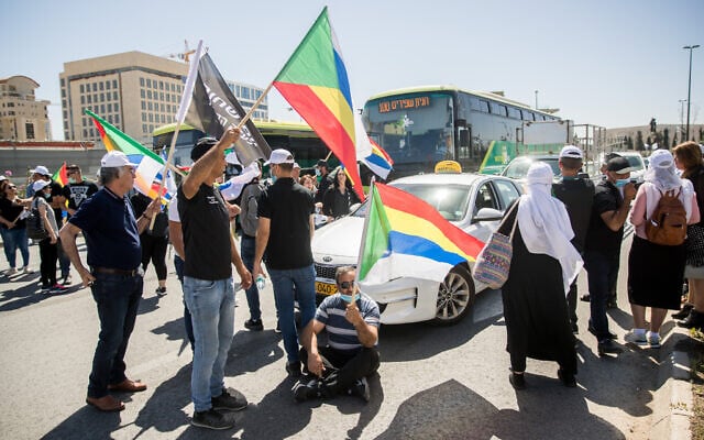 Members of the Druze community protest for the government financial support they were promised by the government, outside the weekly government office at the Ministry of Foreign Affairs in Jerusalem, May 31, 2020. (Yonatan Sindel/Flash90) Members of the Druze community protest for the government financial support they were promised by the government, outside the weekly government office at the Ministry of Foreign Affairs in Jerusalem, May 31, 2020. (Yonatan Sindel/Flash90)