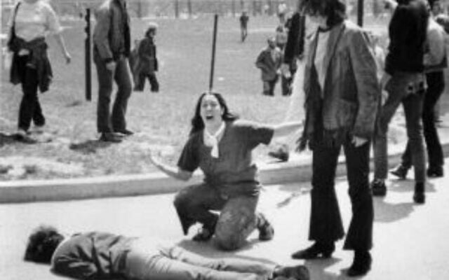 John Filo's Pulitzer Prize–winning photograph of Mary Ann Vecchio, a 14-year-old runaway, kneeling over the body of Jeffrey Miller minutes after he was fatally shot by the Ohio National Guard at Kent State University on May 4, 1970. (JTA) John Filo's Pulitzer Prize–winning photograph of Mary Ann Vecchio, a 14-year-old runaway, kneeling over the body of Jeffrey Miller minutes after he was fatally shot by the Ohio National Guard at Kent State University on May 4, 1970. (JTA)