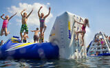 Campers playing on the water at Camp Modin, one of . (Courtesy of Camp Modin via JTA)