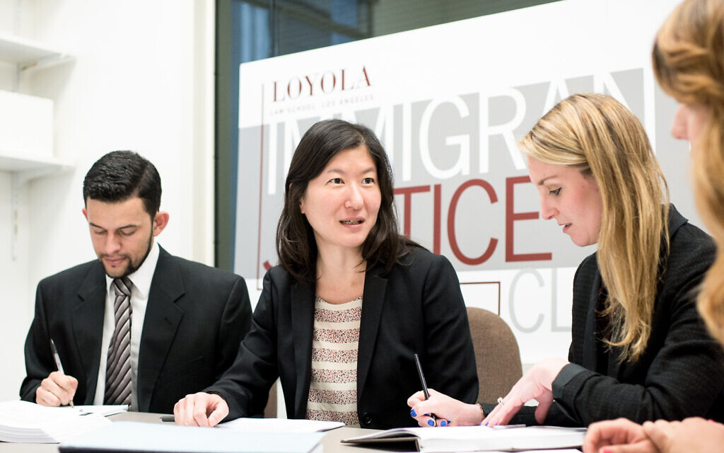 Prof. Kathleen Kim Meers with students enrolled in the Loyola Immigrant Justice Clinic. (Courtesy)