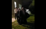 Footage from the FAA Facebook page shows Rabbi Yisrael Knopfler being arrested in Lakewood, New Jersey, May 11, 2020. (FAA/Facebook)