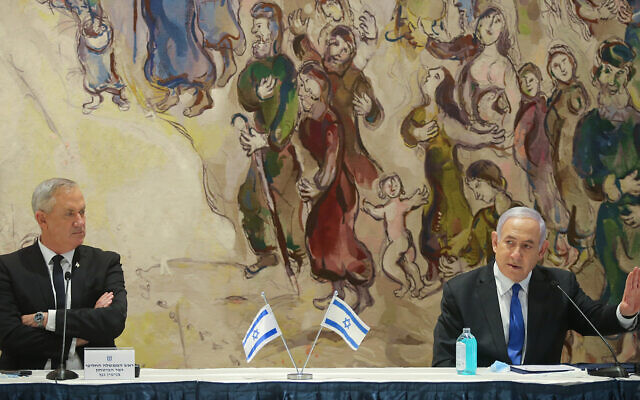 The first meeting of the new unity government, headed by Prime Minister Benjamin Netanyahu, right, and Defense Minister Benny Gantz at the Knesset, May 17, 2020. (Alex Kolomoisky/Pool) The first meeting of the new unity government, headed by Prime Minister Benjamin Netanyahu, right, and Defense Minister Benny Gantz at the Knesset, May 17, 2020. (Alex Kolomoisky/Pool)