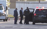 Police at the scene of a suspected murder in Amityville, New York. (Screenshot/CBS New York/YouTube)