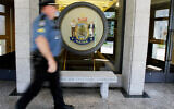 llustrative: A security officer at the State House in Augusta, Maine, July 13, 2011. (AP/Pat Wellenbach)