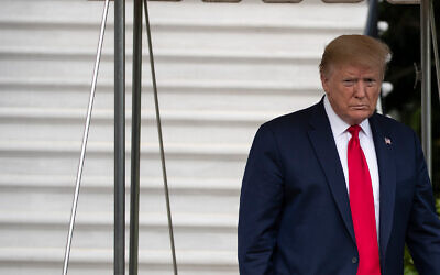 US President Donald Trump walks to speak with reporters as he departs the White House, May 1, 2020.(AP/Alex Brandon)