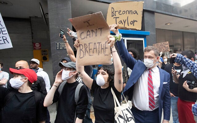 Protesters demonstrate against the the death of George Floyd in New York, May 29, 2020. (AP/Mary Altaffer) Protesters demonstrate against the the death of George Floyd in New York, May 29, 2020. (AP/Mary Altaffer)