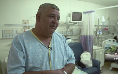 Yuval Carmi at a Rehovot hospital following a heart attack, May 17, 2020. (Screenshot/Channel 13)