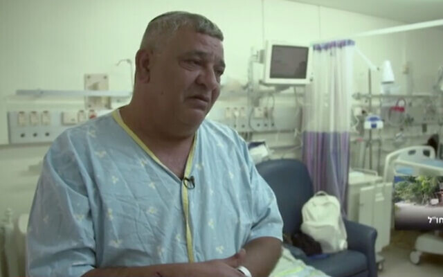 Yuval Carmi at a Rehovot hospital following a heart attack, May 17, 2020. (Screenshot/Channel 13)