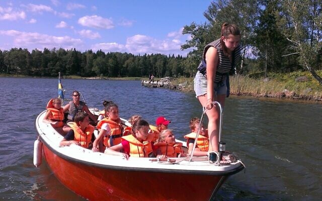 Boating is among the many activities at the 111-year-old Glamsta Jewish summer camp in Sweden. (Courtesy of Glämsta via JTA) Boating is among the many activities at the 111-year-old Glamsta Jewish summer camp in Sweden. (Courtesy of Glämsta via JTA)