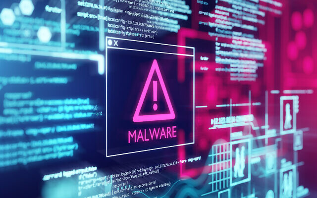 A computer screen with program code warning of a detected malware script program. (solarseven via iStock) A computer screen with program code warning of a detected malware script program. (solarseven via iStock)