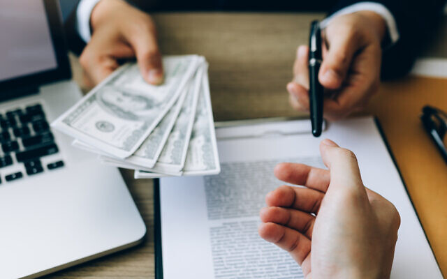 Illustrative image of a payment (wutwhanfoto; iStock by Getty Images)