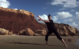 Imre van Opstal, a Batsheva dancer, in a video recorded along with her siblings who are also dancers, each in a spot in nature, as part of the Batsheva Creates Online Festival (Courtesy Imre van Opstal)