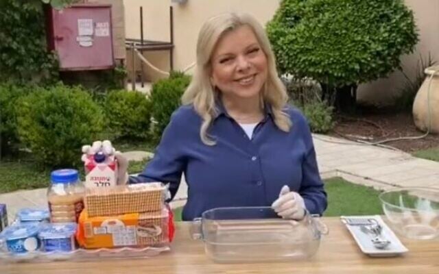 Sara Netanyahu prepares her traditional Independence Day biscuit cake. (Screen capture/Instagram) Sara Netanyahu prepares her traditional Independence Day biscuit cake. (Screen capture/Instagram)