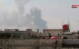An explosion is seen following an alleged Israeli attack on a Hezbollah arms cache near Homs in central Syria on May 1, 2020. (Syrian state media SANA)