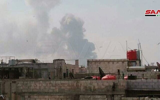 An explosion is seen following an alleged Israeli attack on a Hezbollah arms cache near Homs in central Syria on May 1, 2020. (Syrian state media SANA) An explosion is seen following an alleged Israeli attack on a Hezbollah arms cache near Homs in central Syria on May 1, 2020. (Syrian state media SANA)
