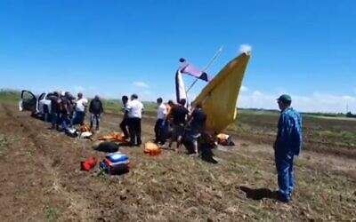 A light crop spraying aircraft crashed near Kibbutz Yakum, May 2, 2020 (Screen grab/Channel 13)