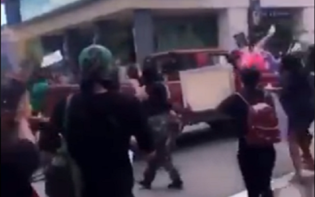 Screenshot from a a video showing a pickup truck driving through a crowd of protesters on May 30, 2020 in Tallahhassee, Florida Screenshot from a a video showing a pickup truck driving through a crowd of protesters on May 30, 2020 in Tallahhassee, Florida