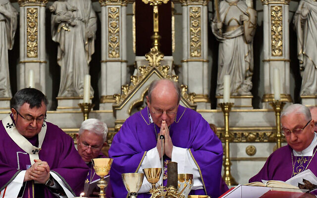 Archbishop of Vienna Christoph Schonborn (C), Archbishop of The Catholic Church in Bosnia Vinko Puljic (L) and Vatican's Apostolic Nuncio in Bosnia and Herzegovina Archbishop Luigi Pezzuto (R), lead the service at The Cathedral of "The Heart of Jesus" in Sarajevo, on March 4, 2018. (ELVIS BARUKCIC/AFP via Getty Images and JTA) Archbishop of Vienna Christoph Schonborn (C), Archbishop of The Catholic Church in Bosnia Vinko Puljic (L) and Vatican's Apostolic Nuncio in Bosnia and Herzegovina Archbishop Luigi Pezzuto (R), lead the service at The Cathedral of "The Heart of Jesus" in Sarajevo, on March 4, 2018. (ELVIS BARUKCIC/AFP via Getty Images and JTA)