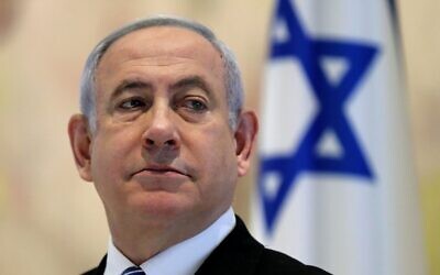 Prime Minister Benjamin Netanyahu attends a cabinet meeting at Chagall State Hall in the Knesset on May 24, 2020. (Abir Sultan/Pool/AFP) Prime Minister Benjamin Netanyahu attends a cabinet meeting at Chagall State Hall in the Knesset on May 24, 2020. (Abir Sultan/Pool/AFP)