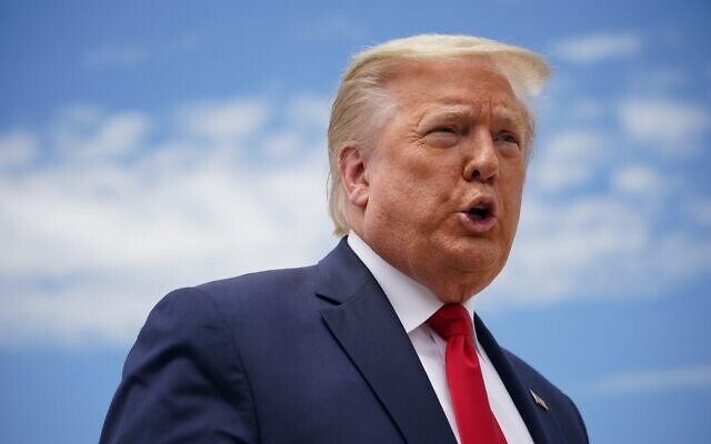 US President Donald Trump speaks to the press before boarding Air Force One as he departs from Joint Base Andrews in Maryland on May 30, 2020. (Mandel Ngan/AFP) US President Donald Trump speaks to the press before boarding Air Force One as he departs from Joint Base Andrews in Maryland on May 30, 2020. (Mandel Ngan/AFP)