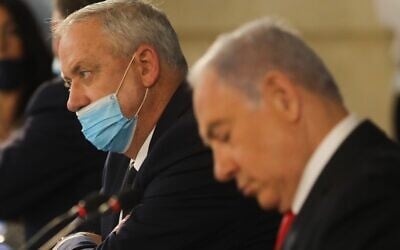 Prime Minister Benjamin Netanyahu (right) and Defense Minister Benny Gantz at the weekly cabinet meeting in Jerusalem on June 7, 2020. (Menahem Kahana/AFP)