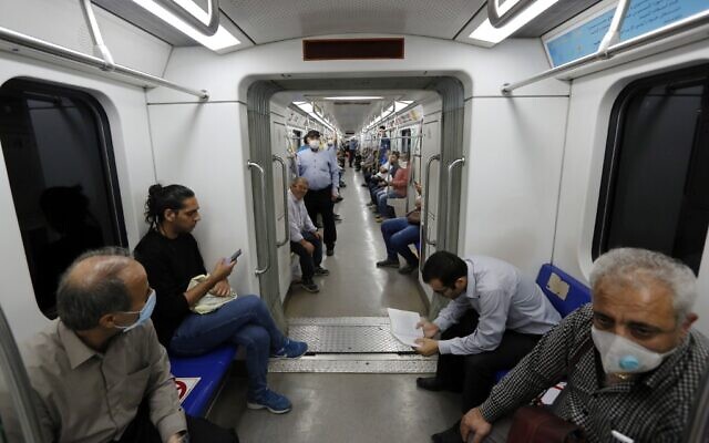 Iranians, mostly wearing face masks, are pictured in a train carriage at a metro station in the capital Tehran on June 10, 2020 amid the coronavirus pandemic crisis (STRINGER / AFP) Iranians, mostly wearing face masks, are pictured in a train carriage at a metro station in the capital Tehran on June 10, 2020 amid the coronavirus pandemic crisis (STRINGER / AFP)