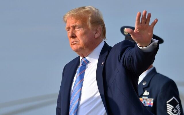 US President Donald Trump waves upon arriving at Joint Base Andrews in Maryland on June 14, 2020. (Nicholas Kamm/AFP) US President Donald Trump waves upon arriving at Joint Base Andrews in Maryland on June 14, 2020. (Nicholas Kamm/AFP)
