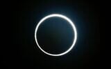 A solar eclipse seen from Yunlin county, central Taiwan, on June 21, 2020. (Photo by Sam Yeh / AFP)