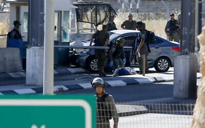 The scene of an alleged car-ramming attempt at a West Bank checkpoint near Abu Dis, east of Jerusalem, June 23, 2020. (Musa Al Shaer/AFP) The scene of an alleged car-ramming attempt at a West Bank checkpoint near Abu Dis, east of Jerusalem, June 23, 2020. (Musa Al Shaer/AFP)