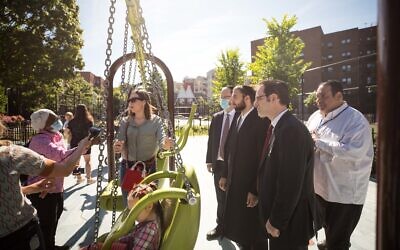 New York City Councilman Kalman Yeger, second from right, at a Brooklyn park, June 16, 2020. Yeger has been fighting to have sleepaway camps opened this summer. (Benjamin Kanter/ via JTA)