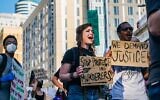 Protesters rally together outside the First Police Precinct Station on June 11, 2020 in Minneapolis, Minnesota (Brandon Bell/Getty Images/AFP)