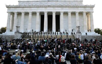 Members of the D.C. National Guard stand on the steps of the Lincoln Memorial monitoring a large crowd of demonstrators participating in a peaceful protest against police brutality and the death of George Floyd, on June 2, 2020 in Washington, DC. (Win McNamee/Getty Images/AFP)