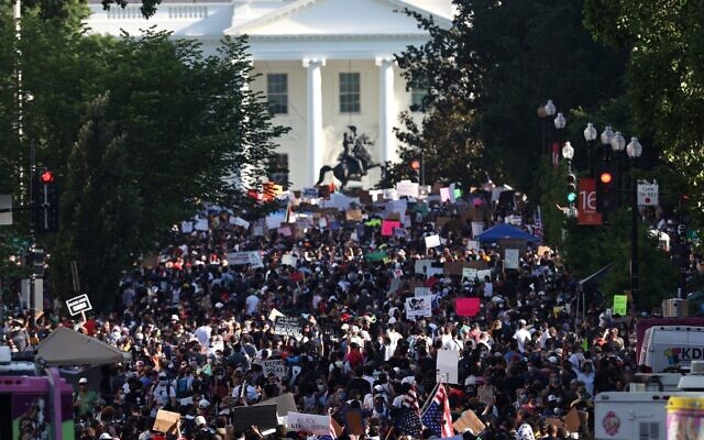 Demonstrators gather on 16th Street and the portion newly named Black Lives Plaza across from Lafayette Park while protesting peacefully against police brutality and racism on June 6, 2020 in Washington, DC. (Win McNamee/Getty Images/AFP) Demonstrators gather on 16th Street and the portion newly named Black Lives Plaza across from Lafayette Park while protesting peacefully against police brutality and racism on June 6, 2020 in Washington, DC. (Win McNamee/Getty Images/AFP)