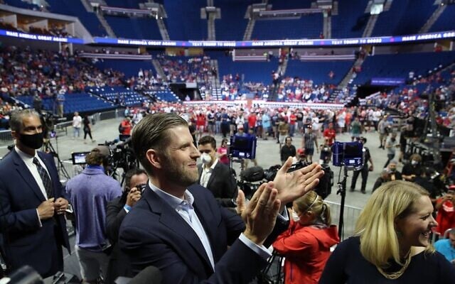 Eric Trump does an interview during a campaign rally for his father US President Donald Trump at the BOK Center, June 20, 2020 in Tulsa, Oklahoma. (Win McNamee/Getty Images/AFP) Eric Trump does an interview during a campaign rally for his father US President Donald Trump at the BOK Center, June 20, 2020 in Tulsa, Oklahoma. (Win McNamee/Getty Images/AFP)