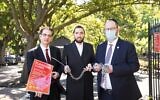 Illustrative: New York State Senator Simcha Felder (right), Assemblyman Simcha Eichenstein (center), and New York City Councilman Kalman Yeger open up Kolbert Playground in the Midwood neighborhood of the Brooklyn borough of New York City on Tuesday, June 16, 2020. (Benjamin Kanter via JTA)