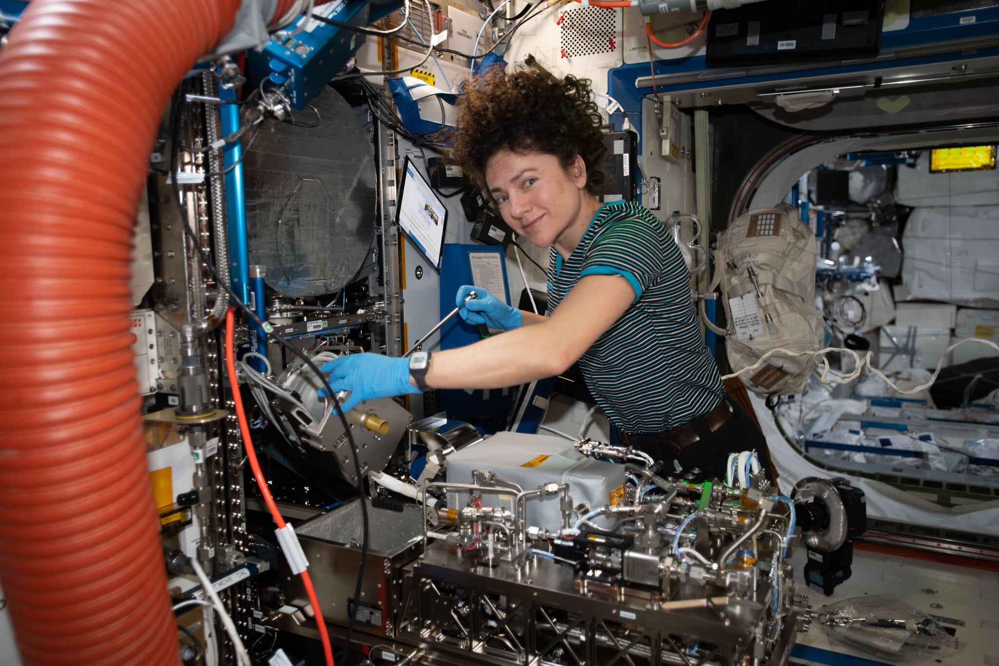 NASA astronaut Jessica Meir working with technical hardware on the ISS. (NASA) NASA astronaut Jessica Meir working with technical hardware on the ISS. (NASA)