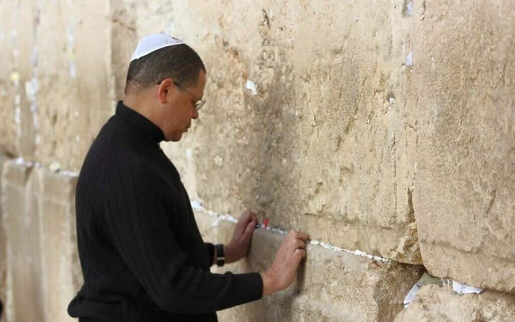 Illustrative: John Eaves, seen on a visit to Israel's Western Wall, says being black and Jewish has made him more attuned to bigotry. (Courtesy of Eaves/via JTA) Illustrative: John Eaves, seen on a visit to Israel's Western Wall, says being black and Jewish has made him more attuned to bigotry. (Courtesy of Eaves/via JTA)