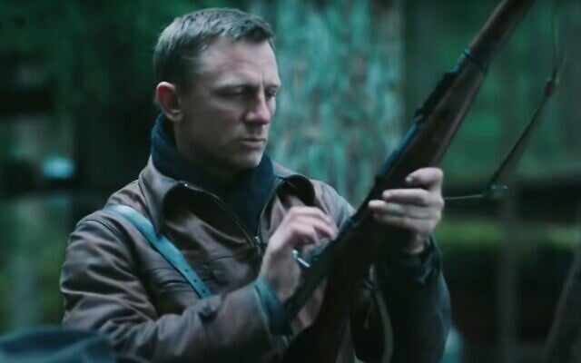 Daniel Craig as a Jew with a gun in 'Defiance.' (Screenshot from YouTube/ via JTA) Daniel Craig as a Jew with a gun in 'Defiance.' (Screenshot from YouTube/ via JTA)