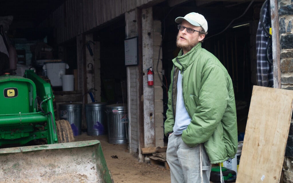 Ian Yosef Hertzmark at his farm in Randallstown, Maryland, in February. His sales of flour have more than doubled during the pandemic. (Mike Tintner/ via JTA) Ian Yosef Hertzmark at his farm in Randallstown, Maryland, in February. His sales of flour have more than doubled during the pandemic. (Mike Tintner/ via JTA)